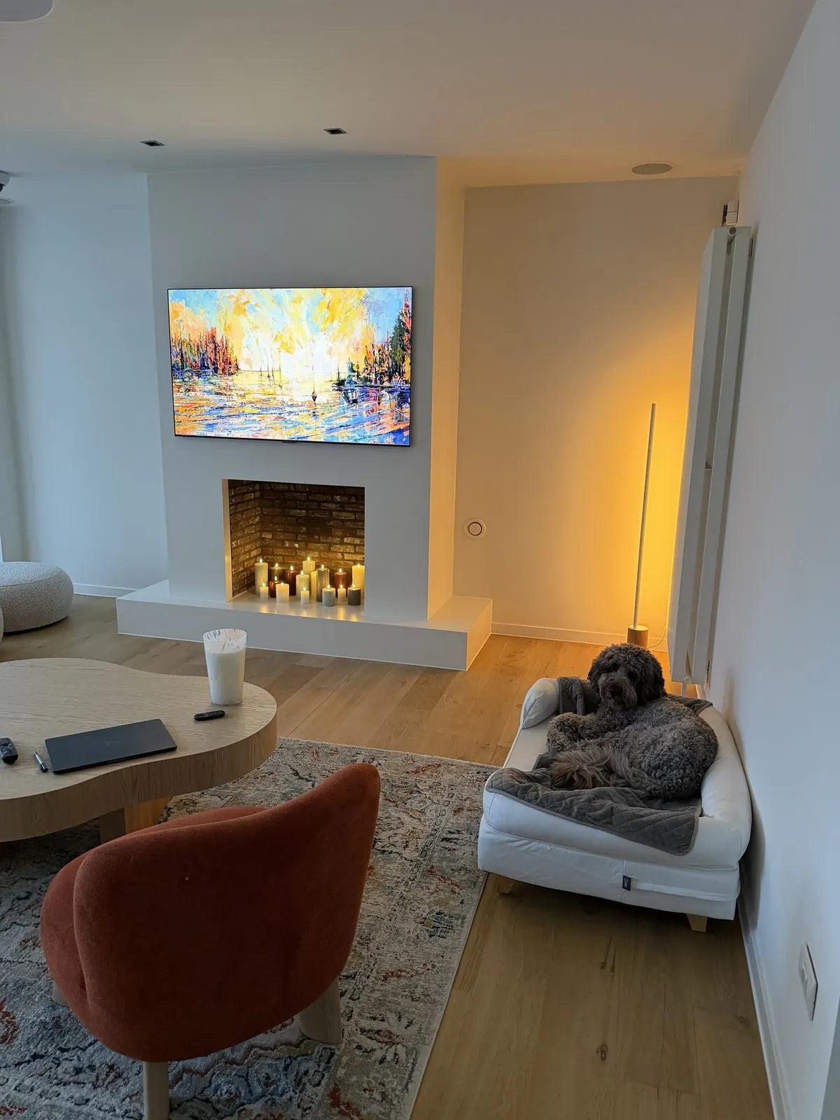 Fireplace with candles and the dog
